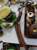 A believed Turkish curved blade sword in leather scabbard