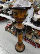A painted pottery planter & pedestal together with an art glass vase
