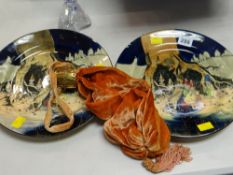 A pair of early twentieth century Royal Doulton goblin & elf plates (damage to both) together with a