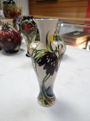 A Moorcroft narrow vase, no. 115, dated 2007 signed N Slany