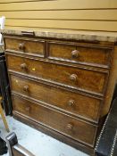 An antique oak chest of three long & two short drawers (distressed)