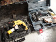 A 110V Bosch hammer drill together with a cased DeWalt hammer drill