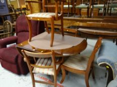 A yew drop flap pedestal dining table & four chairs together with an electric recliner armchair