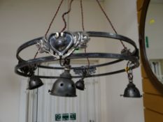 A vintage metallic ceiling light fitting