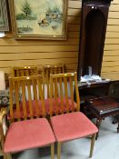 A reproduction corner cupboard, coffee table & four chairs