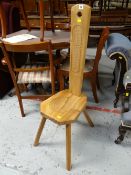 A modern lightwood Celtic spinning-type carved stool