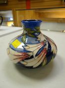 A Moorcroft squat vase in the Ivory Bells pattern, dated 2004, designed by Phillip Gibson
