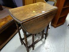 A good compact vintage barley-twist gate leg table