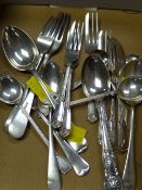 A quantity of silver teaspoons and tea forks