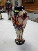 A Moorcroft baluster vase in pattern no. 148/500 by Emma Bossuns, dated 2006