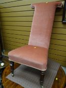 An antique prie-dieu chair