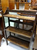 A small oak three-tier open bookcase