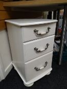 A modern three-drawer Laura Ashley-style chest