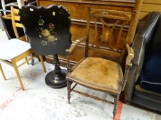 A marquetry elbow chair & an antique papier mache tilt top table (distressed)
