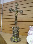 A bejewelled brass nineteenth century Gothic altar cross