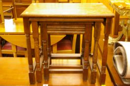 Reproduction oak nest of three side tables