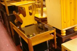 Three tier chrome and black glass entertainment stand, mid Century teak glass topped coffee table