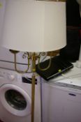 Modern brass standard lamp and a Toshiba DVD player E/T