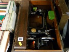 Cased singer sewing machine