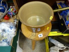 Three legged milking stool and a crock pot