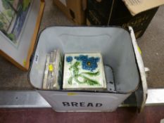 Enamel bread bin with quantity of floral decorated vintage wall tiles