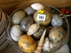 Heavy glass bowl with quantity of onyx eggs, bowls, seashells etc