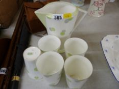 Five Shelley beakers and a matching jug