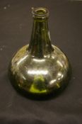 Antique green glass wine bottle with deep set snapped pontil
