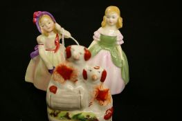 Two Royal Doulton figures 'Babie' HN1679 and 'Penny' HN2338 along with a dog and barrel Staffs
