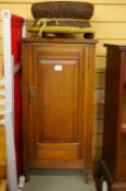 Edwardian mahogany pot cupboard and an antique circular footstool