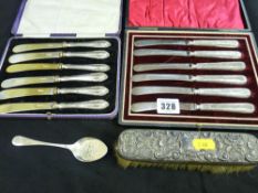 Two cased silver handled butter knives sets, silver jam spoon etc