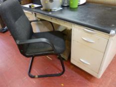 Very heavy (possibly for industrial purposes) twin pedestal metal desk with vinyl top