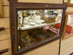 Polished beadwork framed bevelled wall mirror