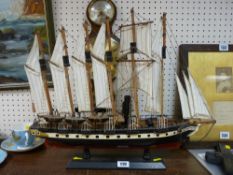 Model of a galleon ship on a plinth