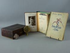 A SECOND WORLD WAR GERMAN WAR MERIT SECOND CLASS BADGE with twin swords, a brass horse swinger and a