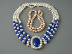 A TRIPLE NECKLACE PARTLY OF PEARLS & LAPIS and with a large oval pearl and lapis centre clasp and