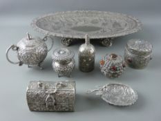 EASTERN UNTESTED WHITE METAL TABLE & ORNAMENTAL WARE (a quantity) to include a 42 cms pierced and