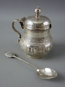 A LIDDED MUSTARD POT with blue glass liner and non-matching spoon, London 1935, 4 troy ozs