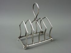 FOUR SECTION SILVER TOAST RACK on ball feet, Birmingham 1886, 1.5 troy ozs