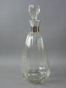AN ART DECO GLASS DECANTER & STOPPER with silver collar, Birmingham 1925, 27 cms high overall with