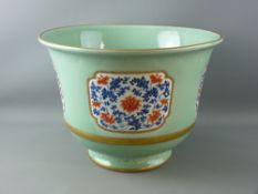 A LARGE CHINESE CELADON JARDINIERE with underglazed blue Qianlong seal mark, the upper and lower