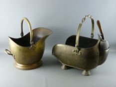 A VINTAGE COAL SCUTTLE with twisted brass swing handle and scoop and a further brass helmet shaped