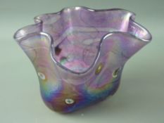 A KRIS HEATON ART FORM VASE having swirled iridescent purple pattern with millefiori cane