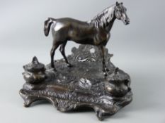 A REPRODUCTION BRONZE DESK STAND signed 'Mene' of a standing horse with lidded cauldron type front