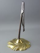 AN 18th CENTURY RUSH NIP LIGHT, the handle with shaped thumb press with pressure spring behind,
