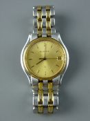 A GENTLEMAN'S CIRCULAR DIAL STAINLESS STEEL & YELLOW METAL BUCHERER WRISTWATCH, no. 955.702, with