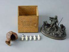 A CAST METAL FIGURAL MATCH STRIKER and a vintage watchmaker's box and contents, the striker modelled