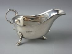 A SILVER CREAM BOAT on three pad supports, 3.9 troy ozs, Sheffield 1969