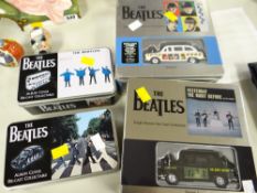 Four boxed Beatles Diecast vehicle collectables
