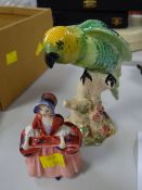 A Royal Doulton figure - 'Bo-Peep' M82 together with a Beswick parrot No.930